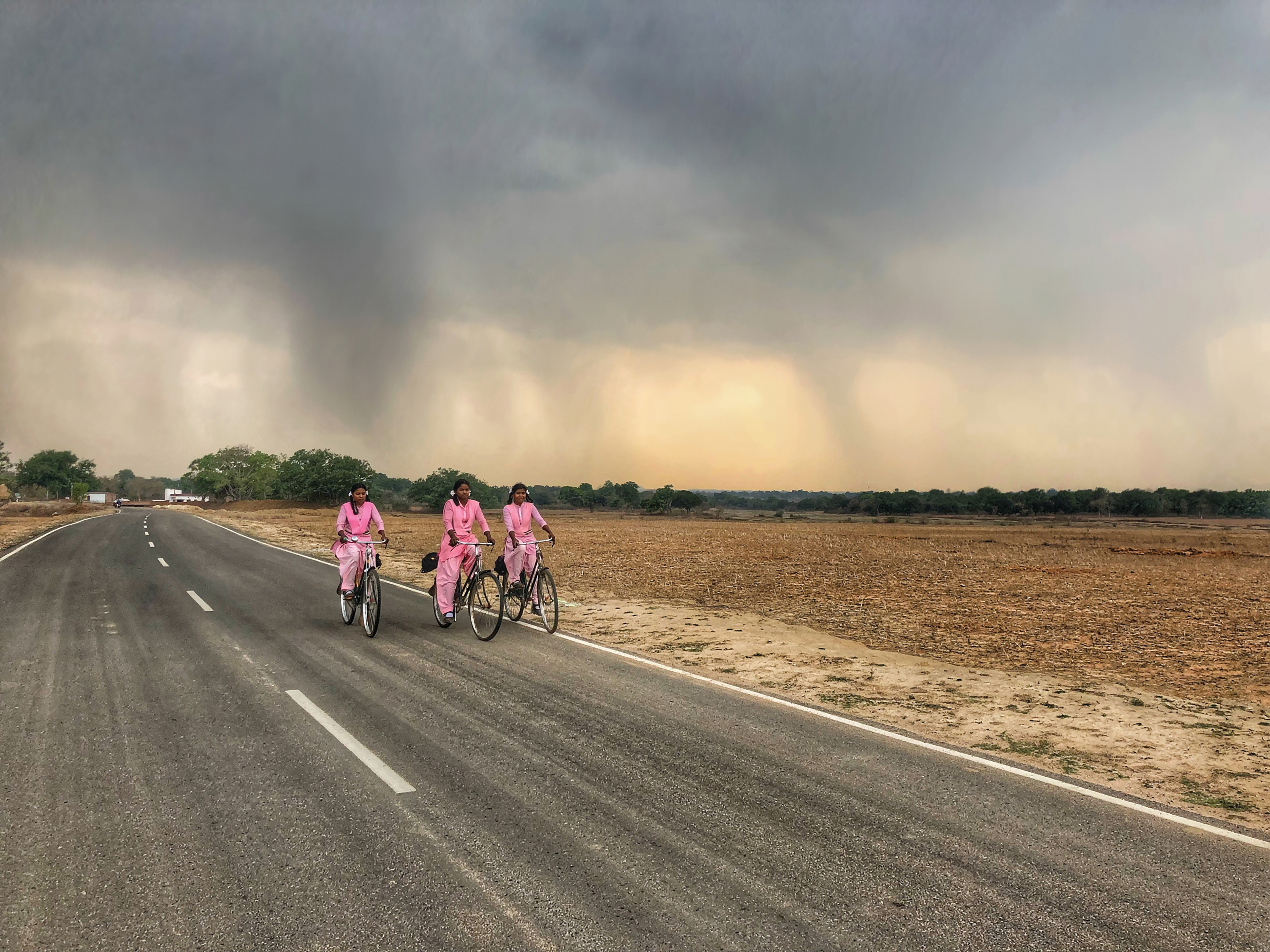 Girls on their way back home from school at Torpa, Jharkhand, India.  This region is affected by social problems like trafficking and witch hunting.